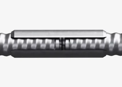Close-up of a Minova SDA patented coupler that connects bars and transmits impact energy to the drill bit in low-headroom conditions
