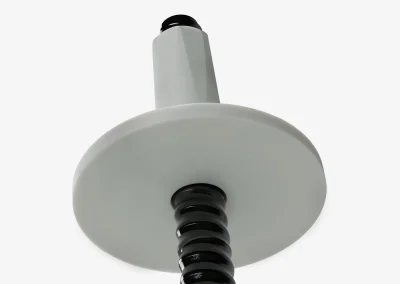 Close-up of a Minova GFRP hollow injection bolt showing the continuous all-thread profile for resin and grout bond