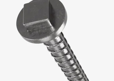 Close-up of a Minova Headed Rebar Bolt showing the forged square head and ribbed shank profile for high load transfer